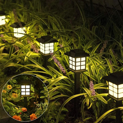 Beeld van  solarlampen in een tuin - kampeerprullenbak.nl